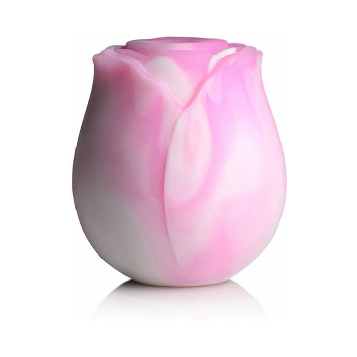 The Rose Dream Pink Swirl Powerful Clitoral Stimulator by XR Brands is elegantly designed with a smooth, glossy surface reminiscent of delicate pink and white rose petals, set against a plain white background.