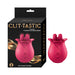 A pink tulip-shaped finger massager made from body-safe silicone with textured petals is next to its black product box. The box displays the product name "Clit-Tastic Tulip Teasing Finger Vibrator" by Nasstoys and states it has "10 functions." Golden swirls embellish the box design, highlighting its vibrating fingers feature.