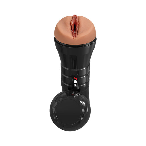 A PDX Juicy Snatch XXL stroker for large penises, featuring a black ultra-realistic anatomical design with a circular handle, crafted from self-lubricating chocolate TPE material.