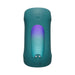 A teal, cylindrical electronic device operates hands-free with a power button on top and a display of purple-to-blue lights. It features symbols and "Lovense" on the front, compatible with the Lovense app for easy control. Product: Lovense Gush 2 Hands-Free Oscillating Masturbator with App.