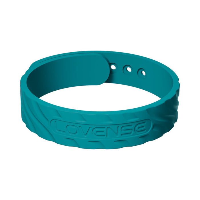 The teal wristband, adjustable and textured with "LOVENSE" embossed, features three resizing holes. It pairs effortlessly with the Lovense app, enhancing your experience with the Lovense Gush 2 Hands-Free Oscillating Masturbator.