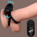 An XR Brands Bang! Cock Ring with Vibrating Bullet and Remote Control, crafted from stretchy black silicone, wraps snugly around a realistic flesh-toned dildo. Blue squiggly lines illustrate the vibrations. To the right of the device, a black remote control labeled "BANG!" displays buttons with plus, minus, power, and wave symbols. This USB rechargeable product offers ultimate convenience.