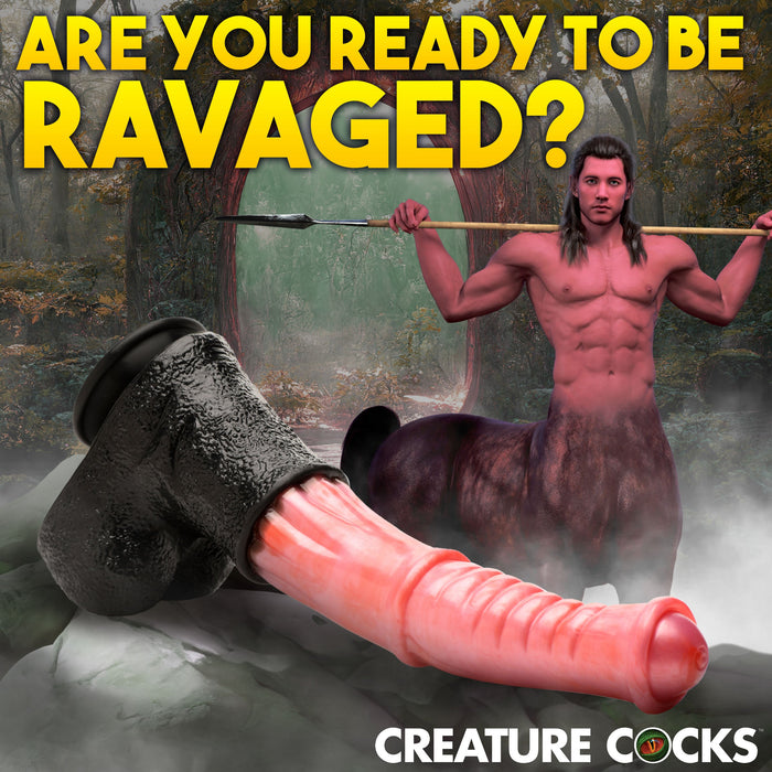 A fantasy-themed image showcases a muscular centaur wielding a spear in a dense forest, with striking text above him that says, "Are you ready to be ravaged?" Below, there's the realistic Centaur Giant 13 Inch Silicone Fantasy Horse Dildo by XR Brands featuring a suction cup base. The text "Creature Cocks" is placed in the bottom right corner.