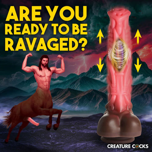 A digitally-created image features a centaur-like creature with muscular arms flexing next to a Deluxe Centaur 10-inch Vibrating & Thrusting Silicone Fantasy Horse Dildo by XR Brands. The visual is completed with arrows indicating motion on the large, sectioned toy. The text reads, "ARE YOU READY TO BE RAVAGED?" and "CREATURE COCKS" at the bottom, hinting at an intense thrusting vibration experience.