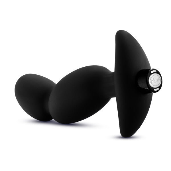 Introducing the Anal Adventures Pinpoint Silicone Vibrating Prostate Massager by Blush. This sleek, black silicone anal plug features a curved base and two smooth, graduated oval bulbs, designed for comfort and ease of use. The base is adorned with a branded metal button inscribed with the word "Blush," and it doubles as a prostate vibrator for enhanced pleasure.