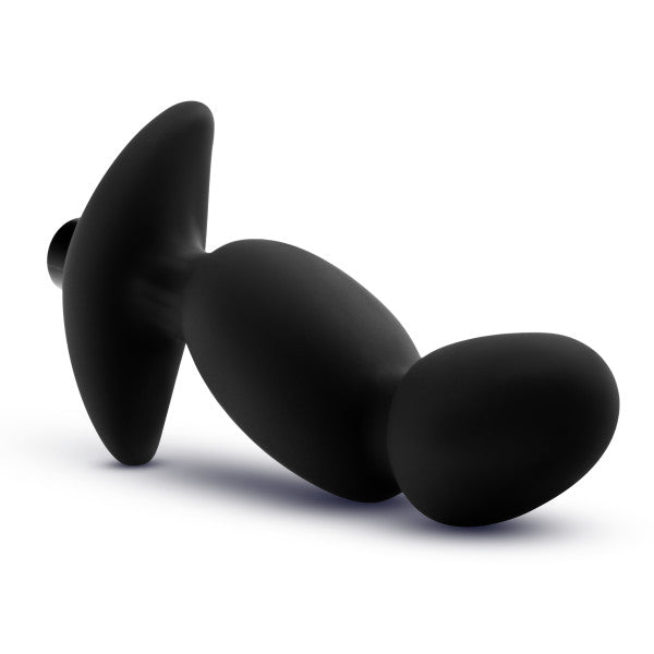 A side view of the Blush Anal Adventures Pinpoint Silicone Vibrating Prostate Massager, showcasing its black silicone material, tapered design, broad base, and smooth finish against a white background. This model includes an integrated 10-speed vibrating bullet for enhanced stimulation.