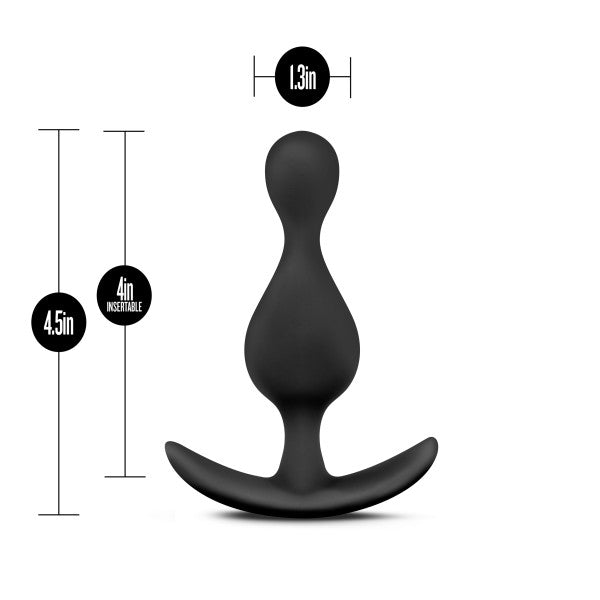 Experience the premium feel of the Anal Adventures Wave Butt Plug by Blush, crafted from platinum cured silicone for exceptional comfort. As part of the Anal Adventures Platinum collection, this ergonomic Black silicone butt plug measures 4.5 inches in total length, with a 4-inch insertable length and a 1.3-inch diameter at its widest point.