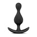 The Anal Adventures Wave Butt Plug by Blush is crafted from satin smooth silicone. It features a black, teardrop-shaped body and a curved T-bar base designed for comfort and safety.