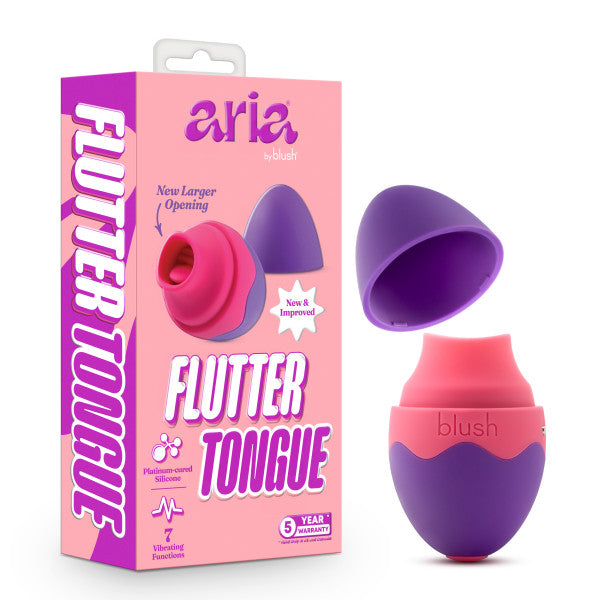 The Aria Flutter Tongue Clitoral Licking Oral Sex Vibrator from Blush, in pink and purple silicone, is displayed alongside its similarly colored box. The packaging highlights several features, including "New & Improved" and boasting 7 vibration modes for an enhanced experience with the flickering arouser.