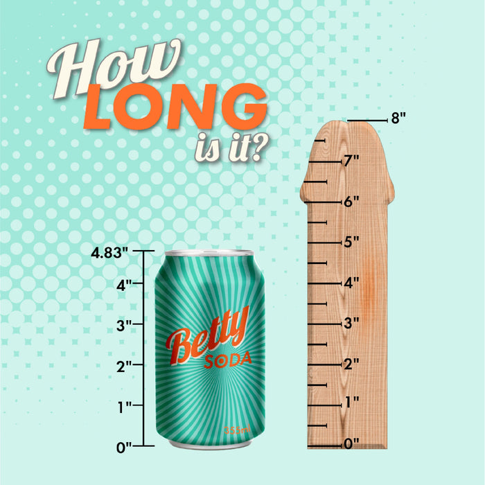 An image displaying a green can of "Betty Soda" next to the Au Naturel 8 Inch Dual Density Suction Cup Dildo with Balls - Caramel by Blush, which is shaped like a phallic symbol and has a flexible spine. The can is 4.83 inches tall and the dildo measures up to 8 inches. The text "How LONG is it?" is at the top left against a dotted teal background.