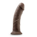 Introducing the Au Naturel 8 Inch Realistic Feel Dual Density Suction Cup Dildo by Blush, available in a rich dark chocolate color. This silicone masterpiece boasts a pronounced head and veiny texture, standing upright on a stable flat base. It features a flexible spine for enhanced realism and comes equipped with a strong suction cup to ensure it stays securely in place during use.