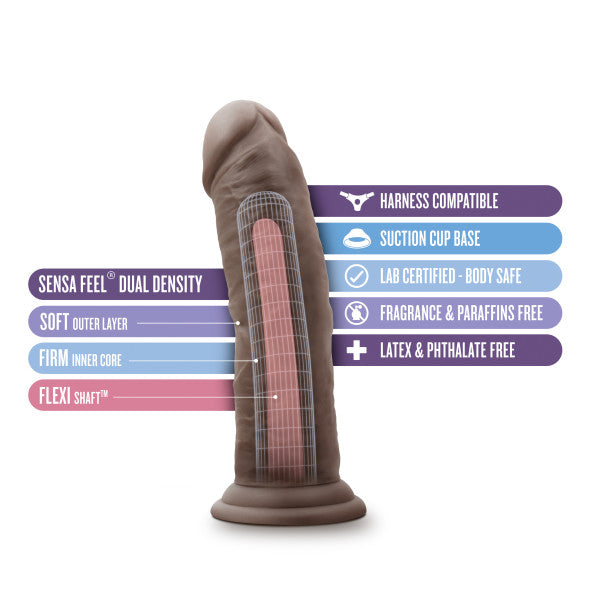 The "Au Naturel 8 Inch Realistic Feel Dual Density Suction Cup Dildo - Dark Chocolate" by Blush is showcased in an image, highlighting its dual-density material with a soft brown outer layer and a firm inner core. Labels emphasize its flexible shaft, gentle exterior, compatibility with harness play, suction cup base for added stability. Additionally, it is lab-certified and free of latex, phthalates, fragrances, and paraffins.