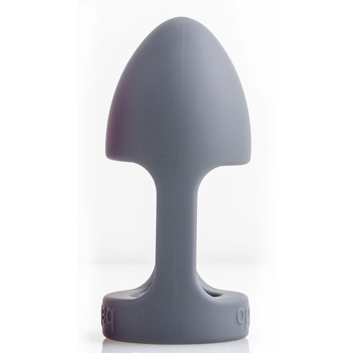 The Balldo: The World's First Ball Dildo in a sleek gray silicone, featuring a smooth, tapered shape and a secure flared base. Designed for personal use, it is showcased upright against a plain white background. Ideal for those interested in exploring ballgasm experiences, this versatile item by Balldo is a perfect addition to your intimate collection.