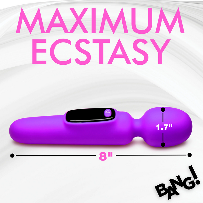 The Bang! First Time Wand Vibrator with Digital Display by XR Brands is a purple silicone device measuring 8 inches in total length and 1.7 inches in width. It features a rounded end and has a button interface on the side along with a small digital screen. The image includes the text "MAXIMUM ECSTASY" in large pink letters and "BANG!" at the bottom corner.