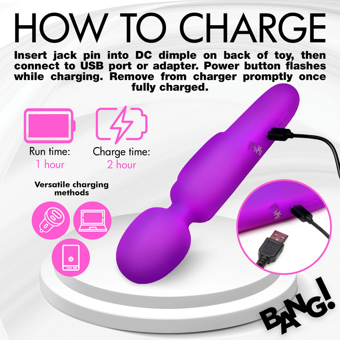 Instructional image on charging an XR Brands Bang! First Time Wand Vibrator with Digital Display - Purple. The toy connects to a USB port with a charging cable. Text includes charging instructions, a charge time of 1 hour, and a run time of 1 hour. Icons depict the travel-friendly charging process and features.