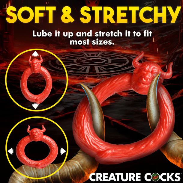 A red, flexible ring showcasing a demonic face design is depicted. Crafted from stretchy silicone, the Beast Mode Fantasy Cock Ring by XR Brands is described as "soft and stretchy," with arrows highlighting its expandable nature. The background reveals a dark, fiery setting. Achieve an intense climax with the BEAST MODE Fantasy Cock Ring! The text includes product instructions and the phrase "CREATURE COCKS.