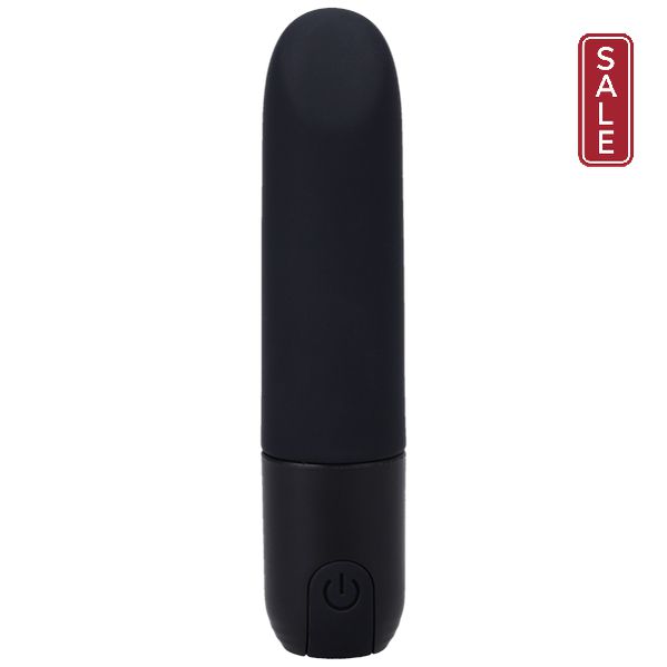 Introducing the Doc Johnson Beginner Classic Black Silicone Bullet Vibrator In a Bag: a sleek, black, cylindrical personal massager with a smooth surface. It features a power button at the bottom front and boasts a classic, lipstick-shaped design that is USB rechargeable and waterproof. This product embraces minimalist and modern aesthetics for an elegant experience.