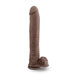 The Big Daddy 14 Inch Dual Density Suction Cup Dildo - Chocolate by Blush is a realistic-looking dildo with a pronounced head, veiny texture, and a strong suction cup base. It also features attached testicles for an authentic appearance.