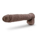 The Big Daddy 14 Inch Dual Density Suction Cup Dildo - Chocolate from Blush is a realistic brown silicone toy complete with a detailed shaft, head, and testicles. It features dual density for a lifelike feel, a flexible spine for versatile positioning, and comes with a strong suction cup base. Shown on a white background.