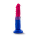 The Bisexual Pride 7.5 Inch Silicone Suction Cup Dildo by Blush is crafted from platinum cured silicone and features a textured surface with a slightly curved shape. This dildo boasts a gradient color scheme of pink, purple, and blue, complete with realistic detailing for an enhanced experience.