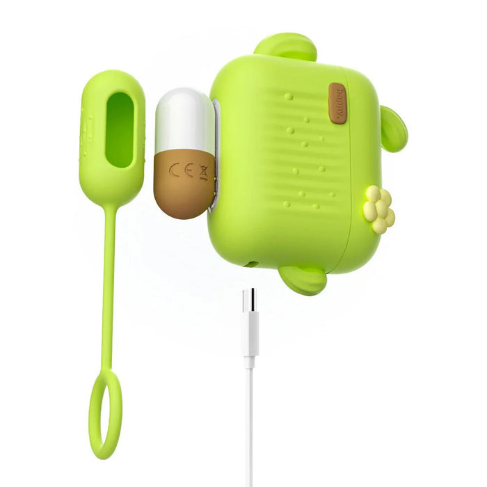 Introducing the Blush Blooming Bliss First Time Bullet & Egg Vibrators with Charging Case & Remote: a whimsical, green charging case shaped like a turtle. It features a small detachable accessory on the side and has a USB-C charging cable attached at the bottom. A charming flower-shaped button decorates the back, while the playful design conceals an added convenience—a discreet wireless remote control for effortless access.