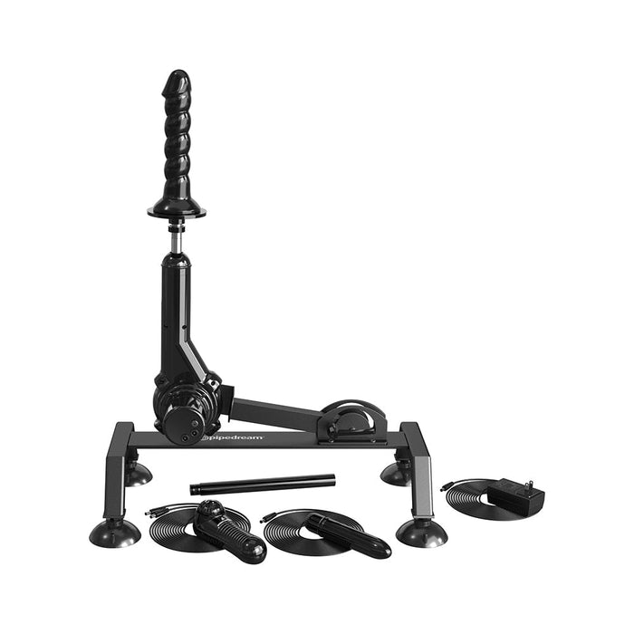 The Pipedream Products Body Dock Thrusting Sex Machine with Remote is a versatile piece equipped with attachments on a stand and suction cups. It includes various circular components and a plug in front, along with a raised arm featuring a textured, elongated black object mounted on top.