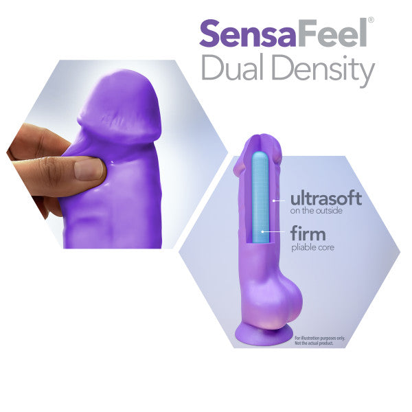 An image of the Bold Beefy 7 Inch Dual Density Suction Cup Dildo - Purple from Blush with a flesh-like texture. A hand is squeezing its surface to demonstrate the softness. Inset shows a cross-section revealing a firm, pliable core. Text reads "Sensa Feel® Dual Density" with descriptions indicating "ultrasoft" outside and "firm" core, perfect for a hands-free ride.