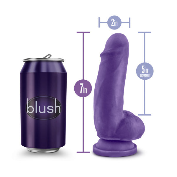 A purple can labeled "Blush" sits next to a substantial dildo. The Bold Beefy 7 Inch Dual Density Suction Cup Dildo by Blush is approximately 5 inches insertable and 7 inches tall, with a diameter of 2 inches. The image includes measurements for comparison.