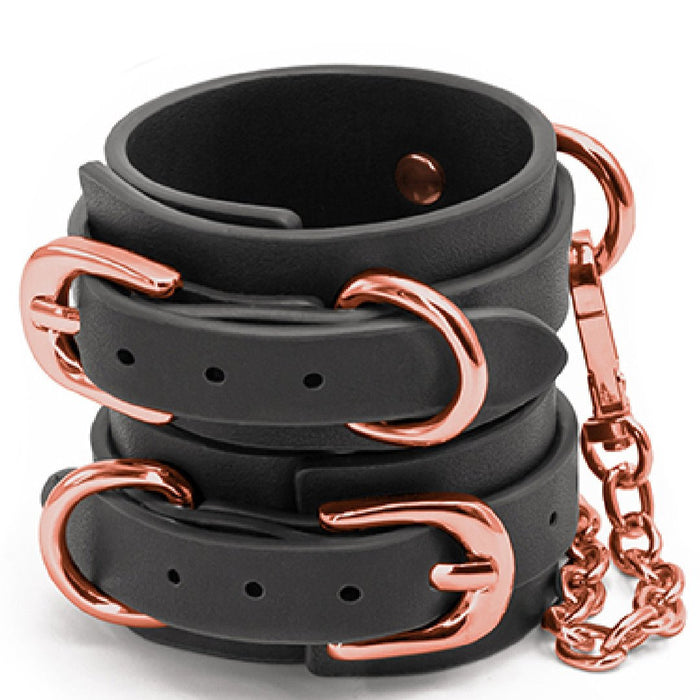 Bondage Couture Vegan Leather Wrist Cuffs - Black one on top of each other 