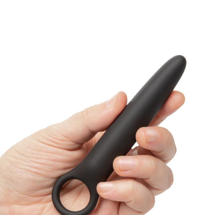 Calex Boundless Dilator held by a hand on a white background