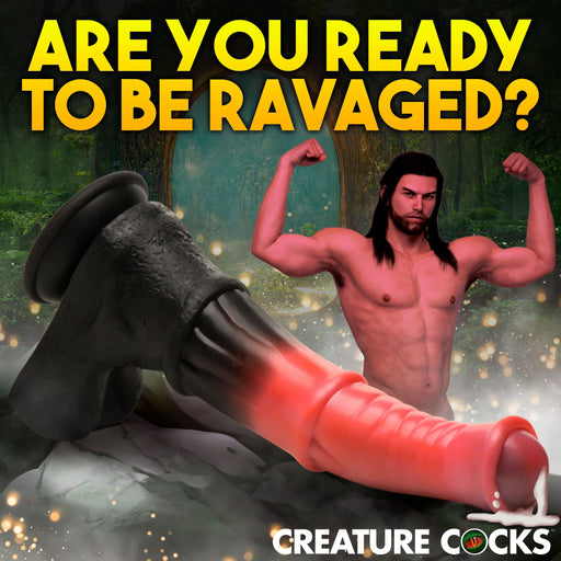 ARE YOU READY TO BE RAVAGED?" is written at the top in bold yellow letters. The image features a fantasy-themed scene with a muscular shirtless man flexing his arms in the background. In the foreground, there is a Centaur Explosion Squirting 9.5 inch Silicone Fantasy Horse Dildo attached to the surface by a suction cup base. The words "CREATURE COCKS" from XR Brands appear at the bottom right.