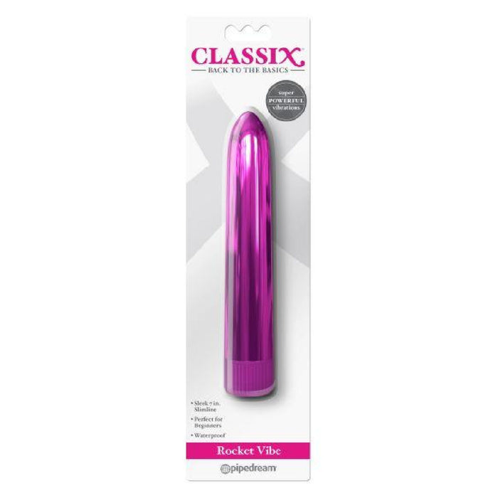 The Classix Rocket Slimline 7 Inch Vibrator in pink is packaged in a white box with "Classix" prominently displayed at the top. The packaging highlights features such as a powerful motor and being waterproof, and includes the "Pipedream Products" brand logo at the bottom.