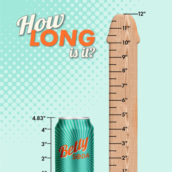 Image of a humorous comparison between a Betty Soda can and an ultra-realistic Colours Realistic 12 Inch Silicone Suction Cup Dildo - Black by NS Novelties with ruler markings. The soda can measures 4.83 inches, while the wooden shape is marked up to 12 inches. Text at the top reads "How LONG is it?