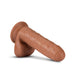 The Coverboy Derek the Bartender 7 Inch Uncut Dildo - Mocha by Blush is a realistic silicone dildo designed to resemble a human penis, featuring a suction cup base and textured veins.