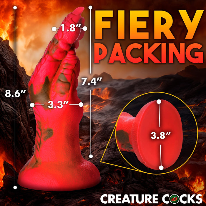 A red and black textured adult toy, made from high-quality silicone, is displayed against a fiery background. The toy's width at different points and its height are shown. Bold text reads "FIERY PACKING" on the right. The brand "XR Brands" and the model "Demon Claw Fisting Silicone Dildo" are at the bottom right corner.