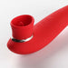 The Destiny Red Clitoral Suction Vibrator with Tongue by Maia Toys is a red silicone vibrator featuring a curved shaft and a suction cup at one end. The device is equipped with several control buttons along the side for multiple settings. This waterproof clitoral sucking toy includes a silver ring detail near its base, all set against a plain white background.