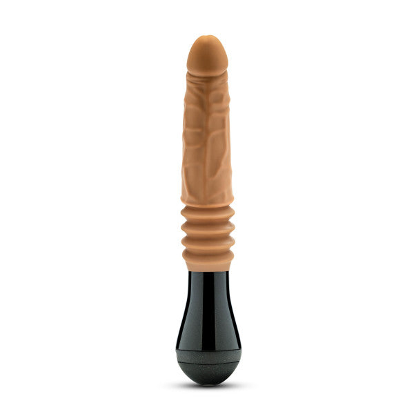 Introducing the Dr. Arthur Vibrating Thrusting Gyrating Realistic Silicone Dildo in a caramel hue by Blush. This phallus-shaped adult toy features a black base, textured veins along the shaft, and ribbed grooves near the base for enhanced grip. Made from body-safe silicone materials, it offers realistic thrusting pleasure.