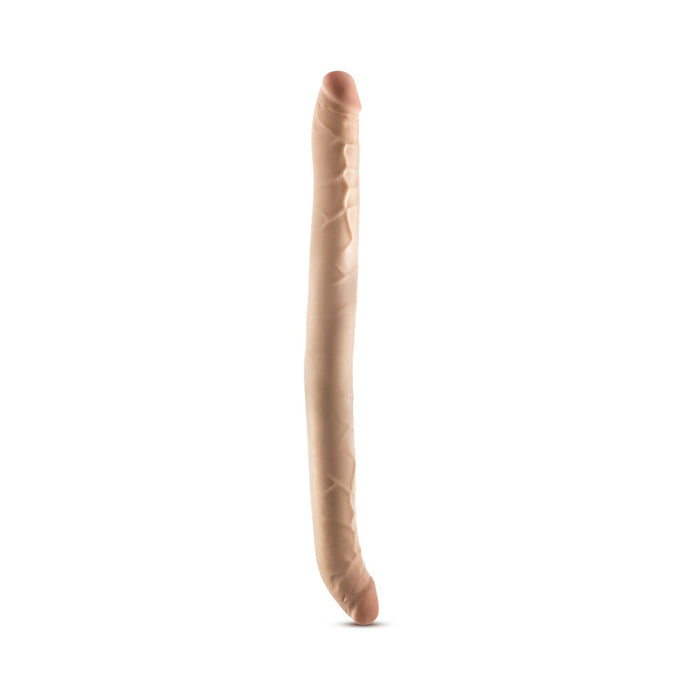 A long, vanilla Dr. Skin Plus 16.5 Inch Posable Double Dildo by Blush, featuring a slightly wrinkled texture, standing upright on a white background.