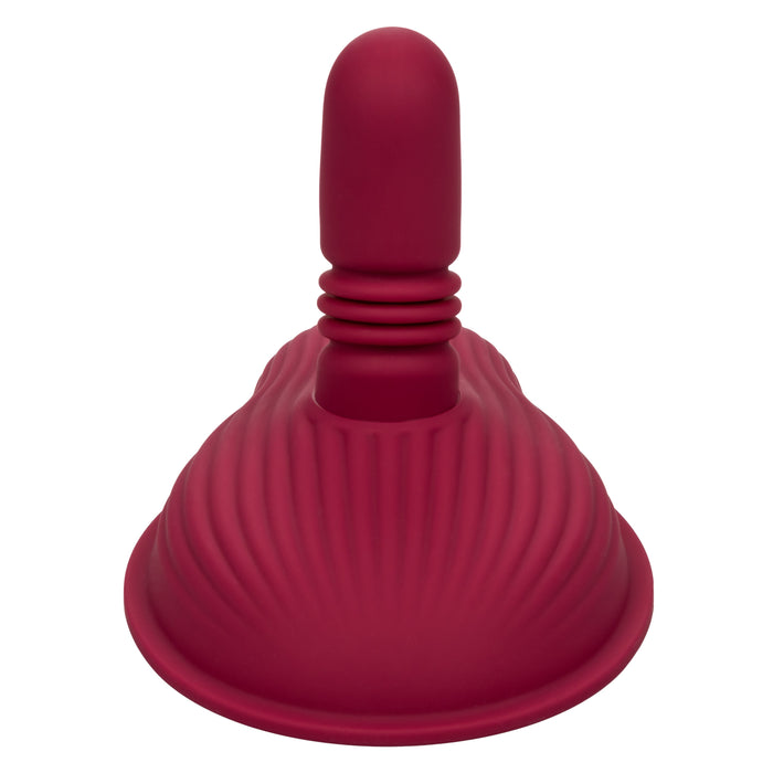 A vibrant red silicone kitchen sink plunger, with a textured handle and a ribbed suction cup base, is designed to tackle kitchen sink clogs effortlessly. It boasts a sturdy, ergonomic grip for ease of use. For an added touch of versatility and a more efficient cleaning experience, consider pairing it with the CalExotics Dual Rider Remote Control Thrust & Grind Humping Vibrator.