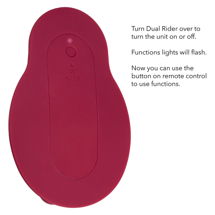 Description: The Dual Rider Remote Control Thrust & Grind Humping Vibrator by CalExotics is a red, oval-shaped waterproof massager featuring a power button and charging port on one side. Accompanying the device are text instructions that read: "Turn Dual Rider over to turn the unit on or off. Function lights will flash. Now you can use the button on the remote control massager to use functions.