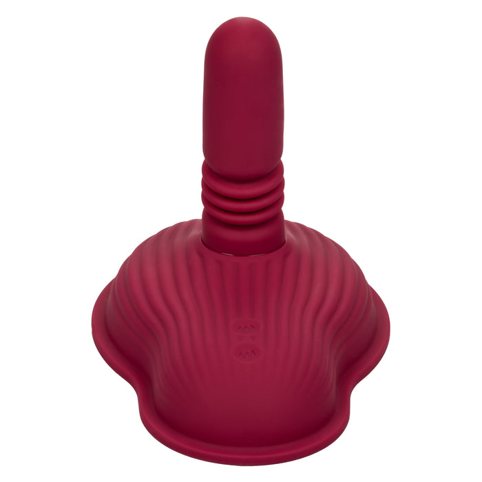 Introducing the Dual Rider Remote Control Thrust & Grind Humping Vibrator by CalExotics. This innovative red silicone vibrator features a ribbed base and a cylindrical top designed for a powerful suction massage. With its smooth, waterproof finish, it's perfect for skin toning and enhancing muscle relaxation.