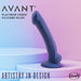 The image showcases a 7.5-inch, curved, phallic-shaped object titled "Ergo" by Blush, an indigo silicone dildo with a suction cup designed for enhanced stimulation. It is placed on a white platform against a pastel pink and blue gradient background. The words "Artistry in Design" and the brand name "Blush" are also visible.