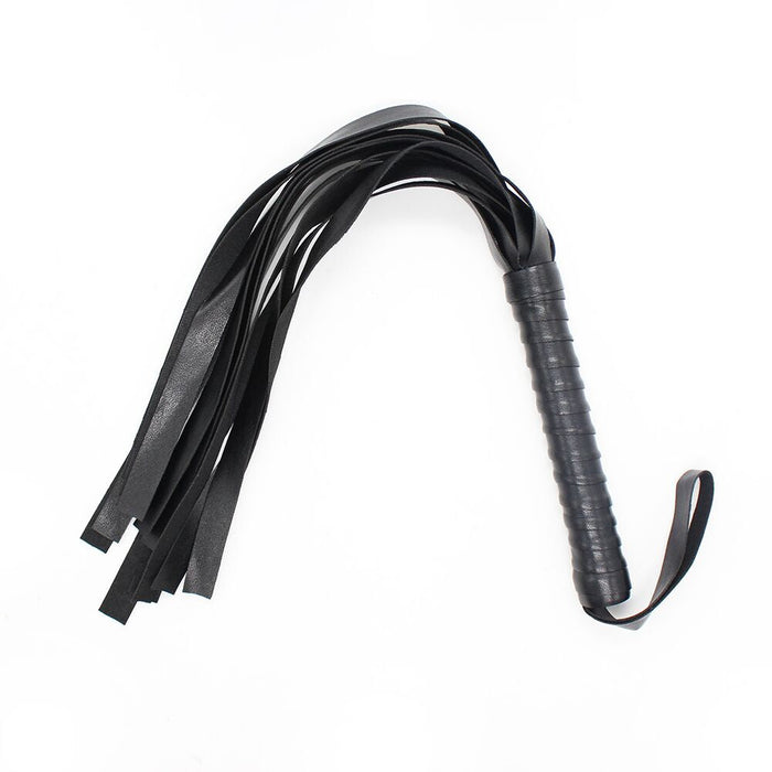 The Everything Bondage 9 Piece Beginner's Bondage Kit - Black by Ple'sur includes a sleek and simplistic black leather flogger with multiple tails and a wrapped handle. The flogger features neatly cut strips for the tails, a ribbed handle for enhanced grip, and a convenient wrist strap at the end, making it an ideal addition to any bondage kit for an exciting sensory experience.