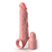 An upright Fantasy 6 Inch Silicone Penis Extension with Ball Strap in vanilla, by Pipedream Products, showcases a realistic veined texture. Beside it lies a complementary cap designed to function as a bullet vibrator, aimed at addressing erectile dysfunction. Both premium items are meticulously crafted from high-quality silicone.