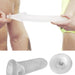 A person holds the Fat Boy Ultra Fat 5.5 Inch Penis Girth Extender Sleeve with Ball Strap by Perfect Fit Brand between their fingers near a shirtless individual, showcasing its ultra-realistic sensation. Below are two views of the extender sleeve: a side view showing its full length and a top view displaying the open end.