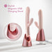 Two pale pink Fraya Thrusting Shaft Powerful Rabbit Vibrators by Blush, featuring a modern design, are displayed on rose gold charging stands. A close-up highlights the magnetic USB charging connection. The text reads "Stylish Magnetic USB Charging Stand" and "USB-C CHARGING CORD." These premium silicone devices offer clitoral stimulators and thrusting vibration modes.