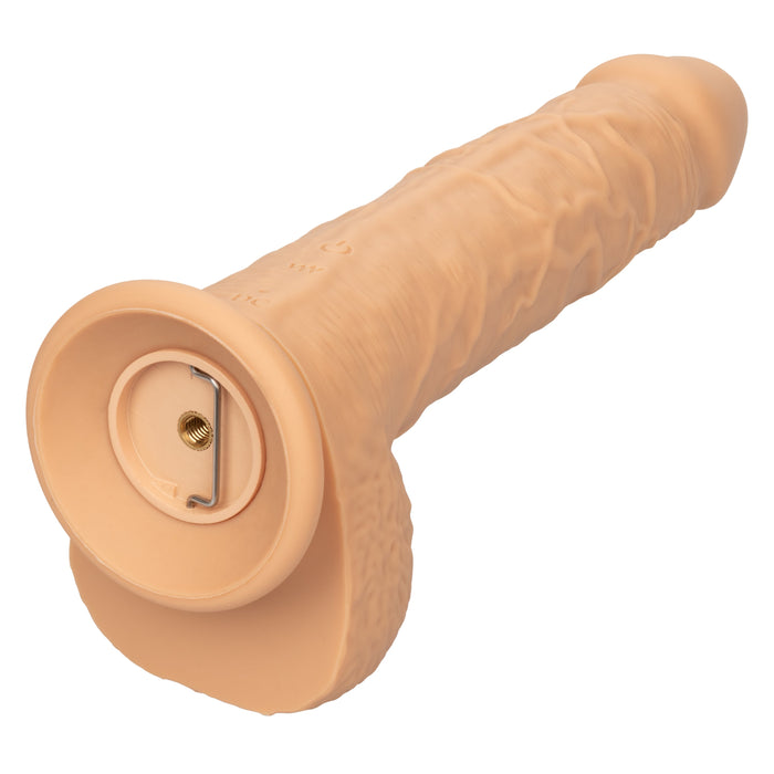 The CalExotics Fuck Stick Squirting Vibrating Silicone Suction Cup Dildo - Vanilla is a realistic flesh-toned dildo with detailed veins and a flared base. It features a threaded circular mount at the base, making it strap-on harness compatible for versatile use or secure mounting for hands-free enjoyment.