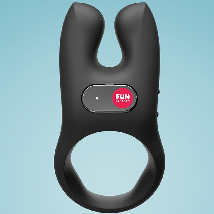 Fun Factory NŌS Vibrating Couples Penis Ring - Black against a blue background