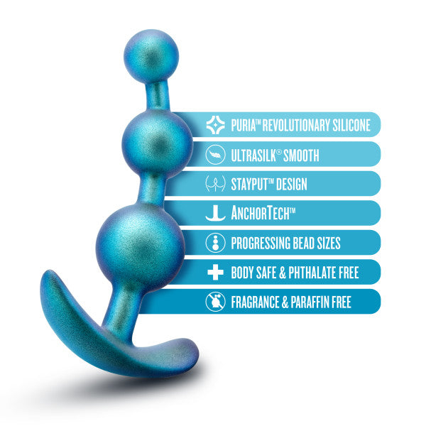 The image showcases the Gamma Silicone Anal Beads & Butt Plug by Blush, a blue silicone toy featuring four beads that gradually increase in size. Notable features include its Puria silicone material, ultrasmooth Ultrasilk finish, StayPut design, AnchorTech for enhanced prostate pleasure, and safety attributes such as being body safe, phthalate-free, fragrance-free, and paraffin-free.