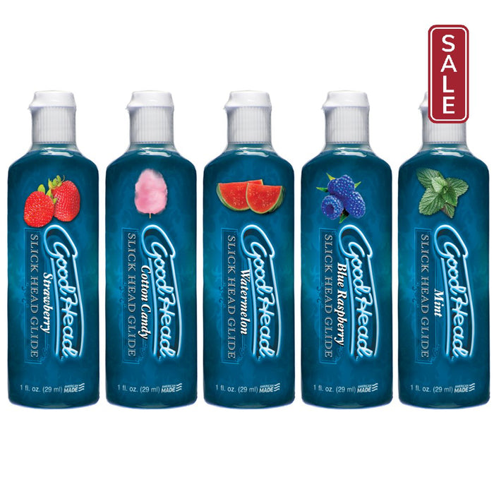 Five bottles of GoodHead Slick Head Flavored Glide Lubricant Assorted 5 pack 1 oz by Doc Johnson cocktail mixer syrups, now featuring body safe flavored lubricant in various flavors including strawberry, cotton candy, grapefruit, blueberry, and mint, lined up against a white